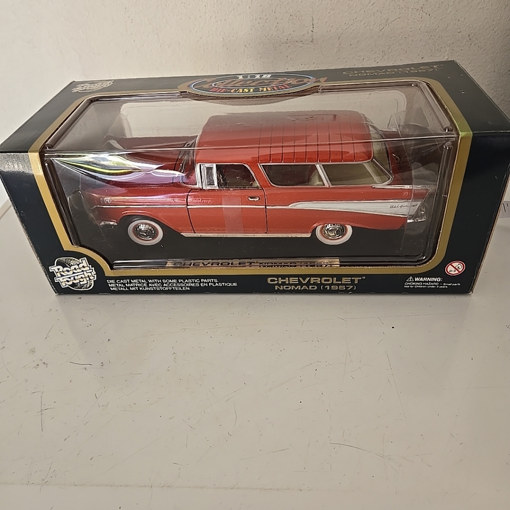 Vintage 1957 Chevrolet Nomad diecast car in 1:18 scale.